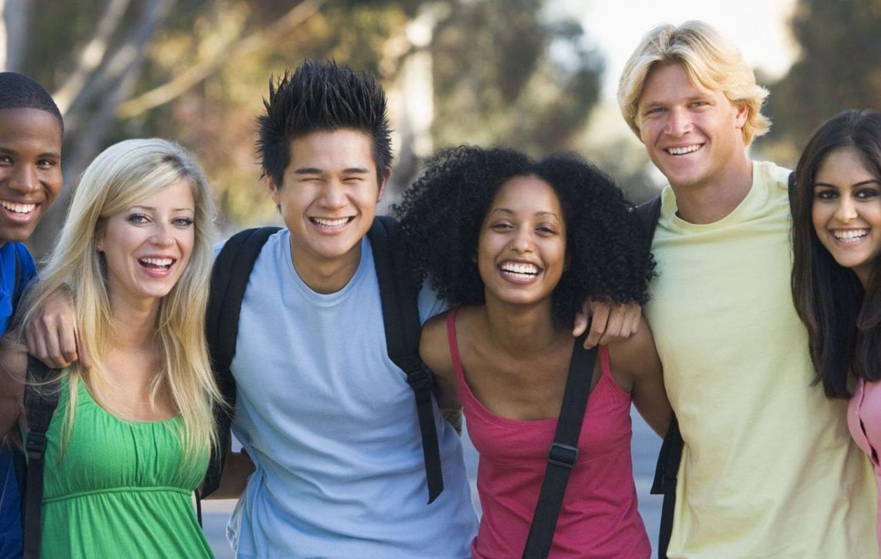 A diverse group of students on a college campus.