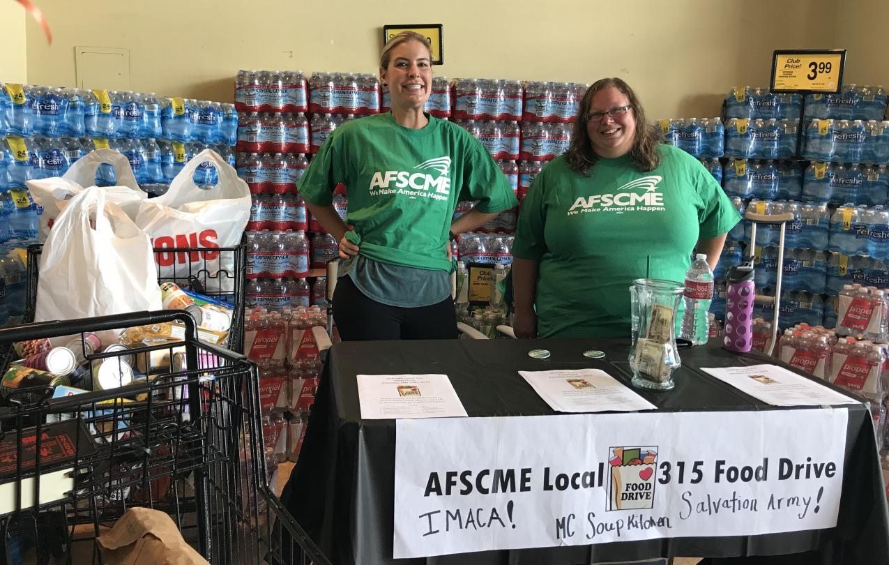 AFSCME Local 315 members Eryn Clark and Laura Bourelle work the booth at the local's food drive in Bishop.