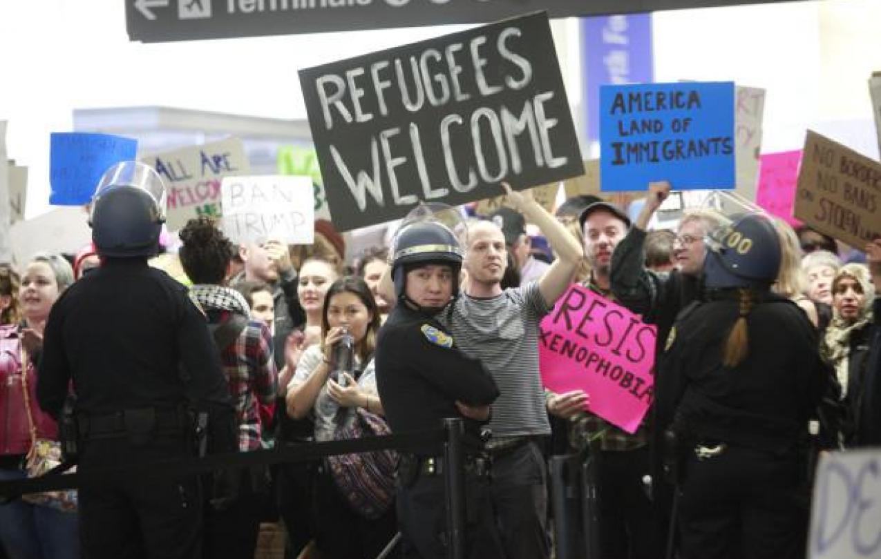 Protesters at SFO condemning President Trump's executive order banning Muslims. (Mercury News)