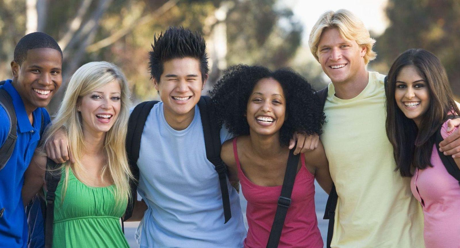 A diverse group of students on a college campus.