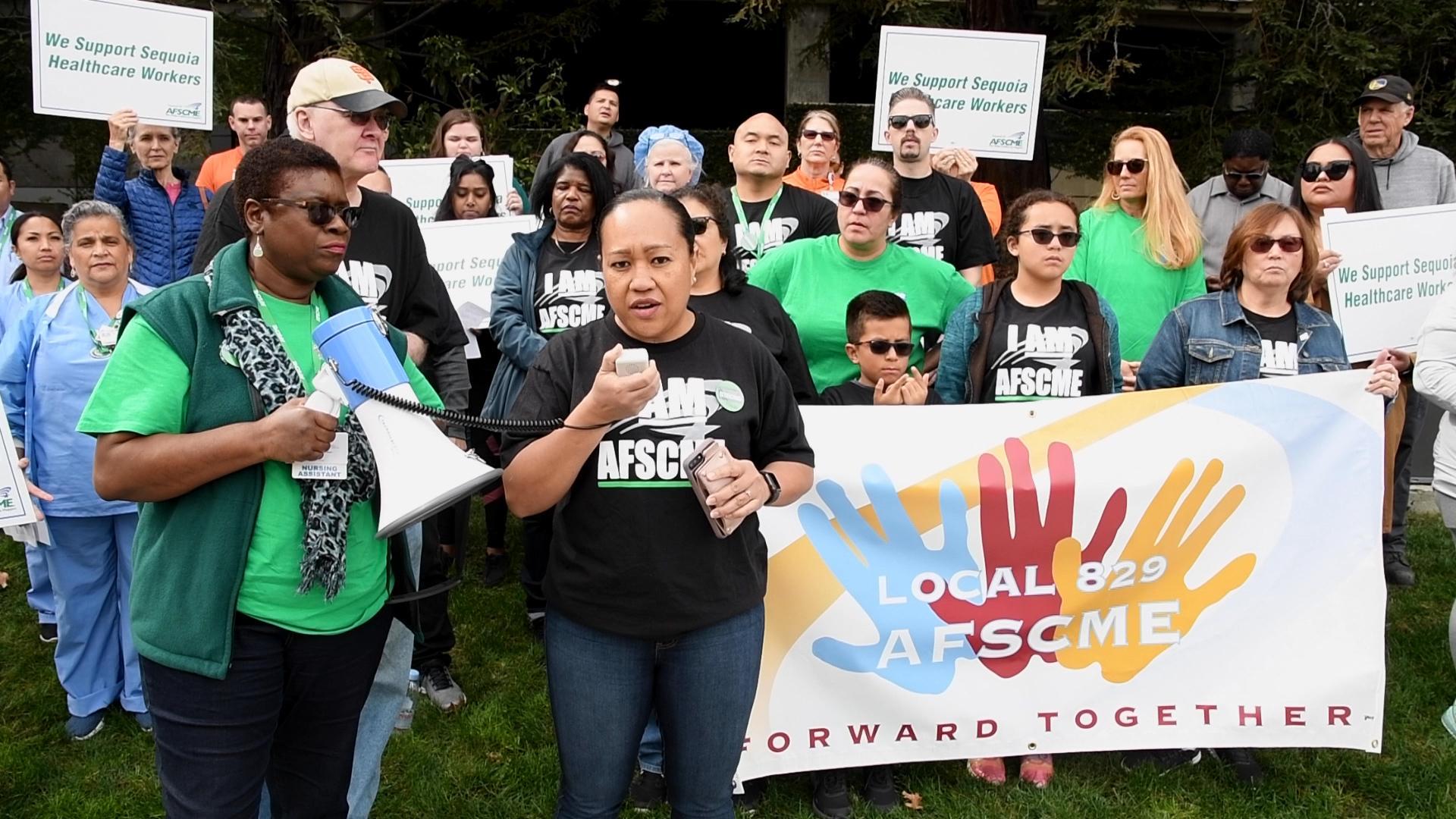 Sequoia Hospital members hold an action outside of the medical facility in Redwood City