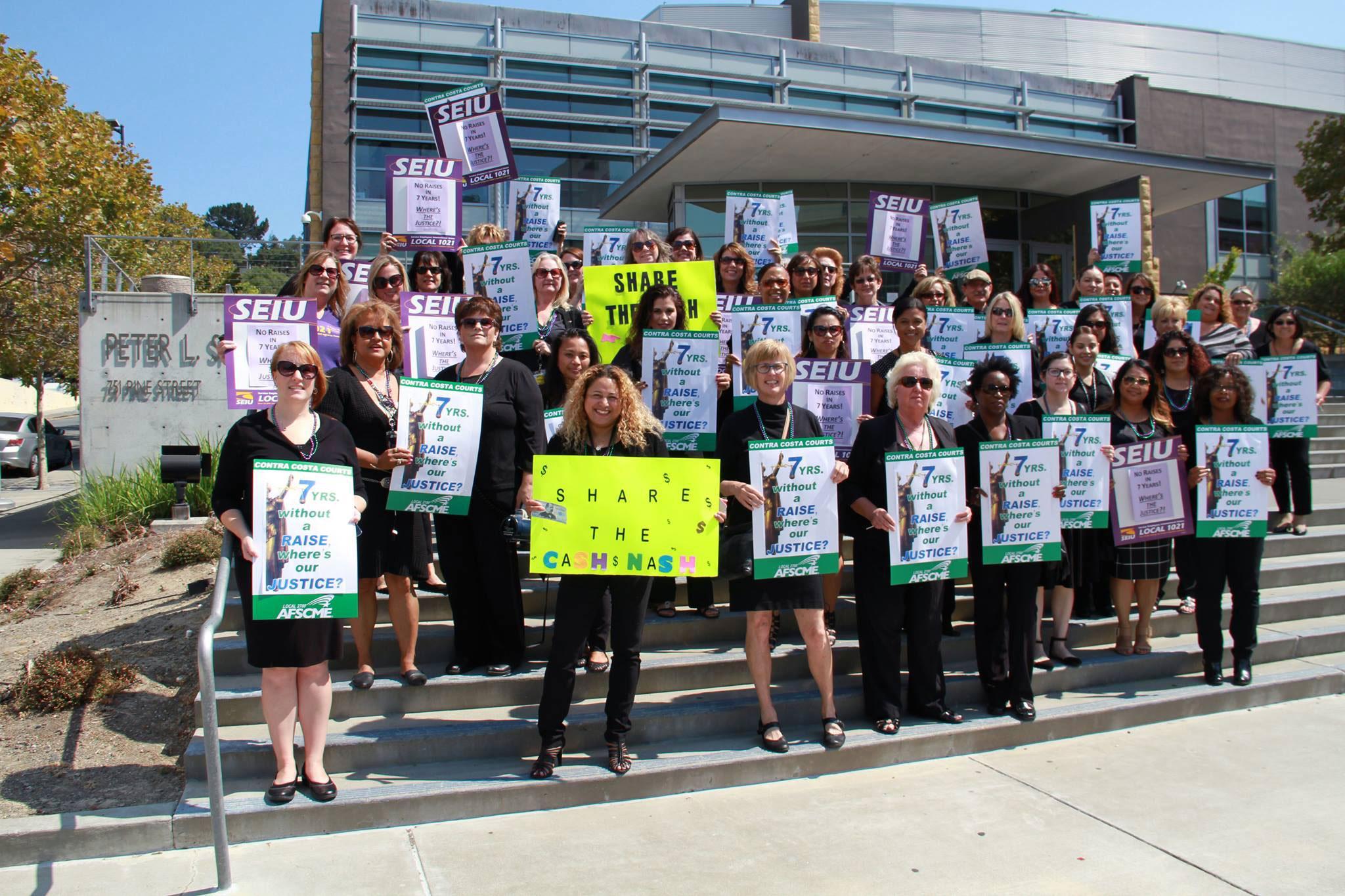 AFSCME and SEIU members hold a rally in front of the Superior Court in Martinez.