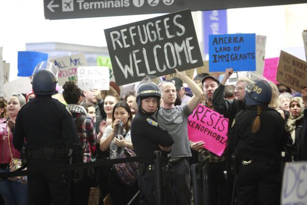 Protesters at SFO condemning President Trump's executive order banning Muslims. (Mercury News)